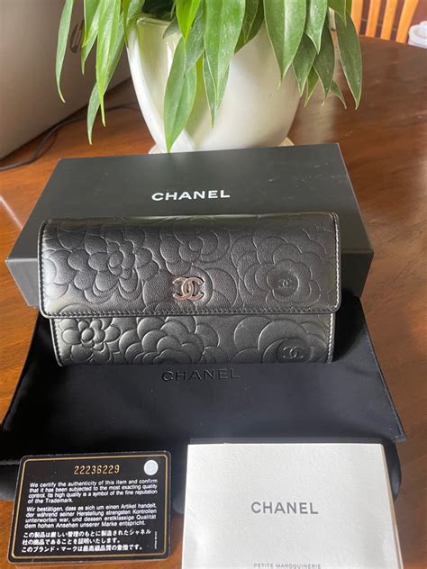 chanel camellia long flap wallet|Chanel camellia wallet price.